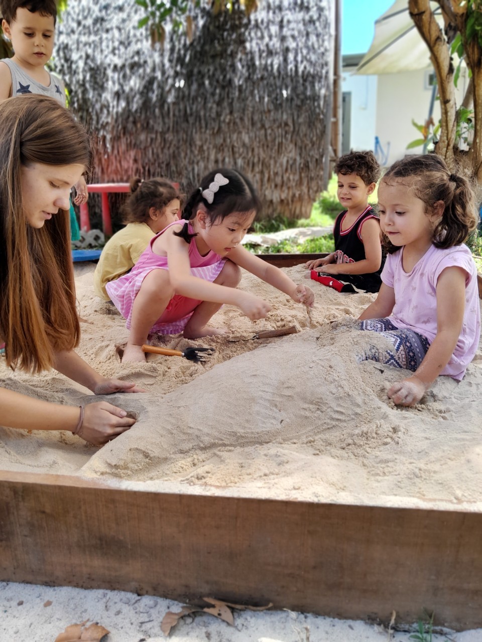 Children playing in sandbox